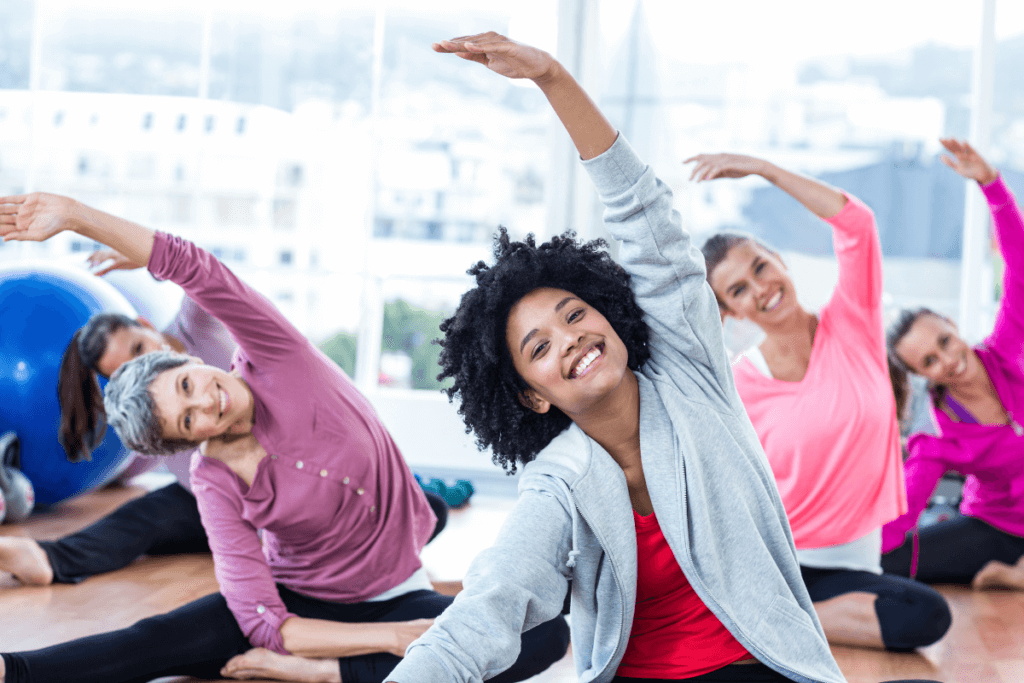 women stretching in workout class